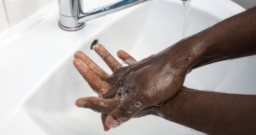 man-washing-hands-carefully-with-soap-sanitizer-close-up_155003-40590